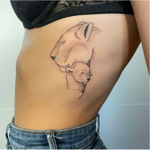 queen lioness and cub tattoo on rib