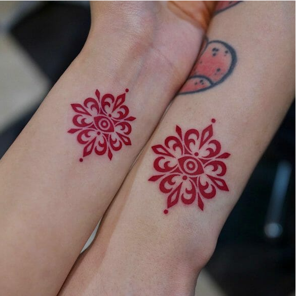 Red ink Tribal Couple Tattoo Ideas - Matching Couple Tattoos