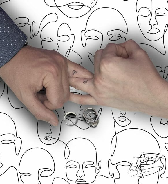 Matching Couple Finger Tattoo
